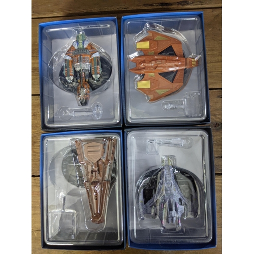 34 - Twelve Star Trek boxed space craft models to include Klingon Bird-Of-Prey (Attack Mode), Kazon Raide... 