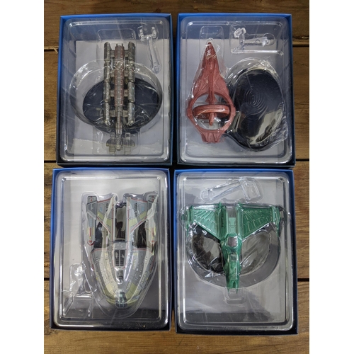 35 - Twelve Star Trek boxed space craft models to include Gorn Starship, U.T.S Aeon, Spaceplane OV-165, T... 