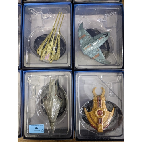 37 - Twelve Star Trek boxed space craft models to include Bajoran Assault Vessel, Xindi Reptilian Warship... 