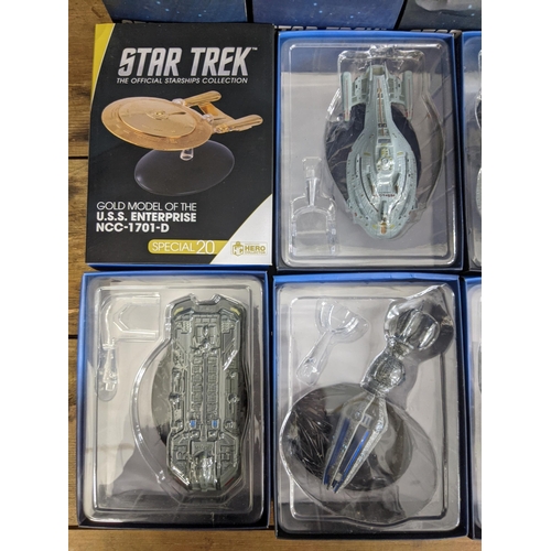 38 - Twelve Star Trek boxed space craft models to include Fesarius, Eymorg Ion Drive Ship, Borg Sphere, G... 