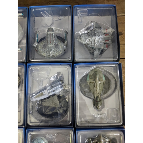 39 - Twelve Star Trek boxed space craft models to include Saber Class, Romulan Bird-of-Prey (2266), Axana... 