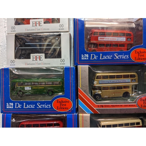 79 - A large collection of model buses to include Exclusive First Editions and later 00 gauge, together w... 