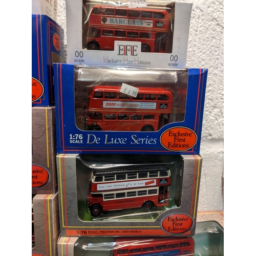 79 - A large collection of model buses to include Exclusive First Editions and later 00 gauge, together w... 