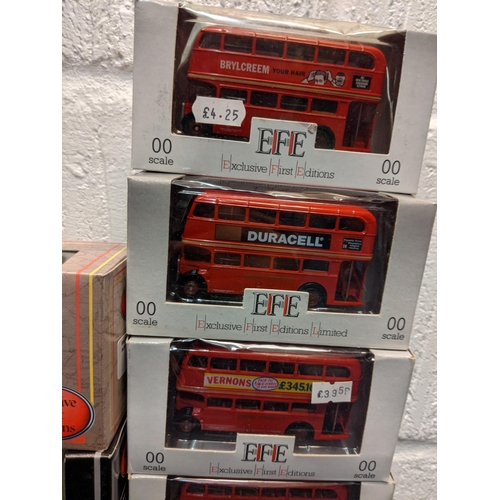 79 - A large collection of model buses to include Exclusive First Editions and later 00 gauge, together w... 