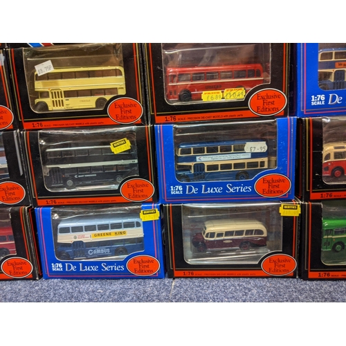 90 - Twenty five boxed Exclusive First Edition model buses to include a Bristol LS Bus Harts & Dorset 163... 