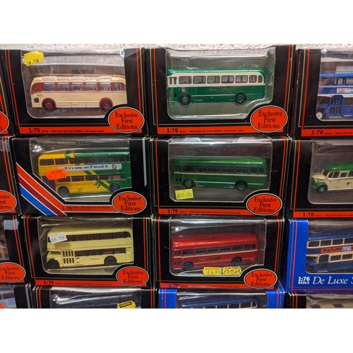 90 - Twenty five boxed Exclusive First Edition model buses to include a Bristol LS Bus Harts & Dorset 163... 