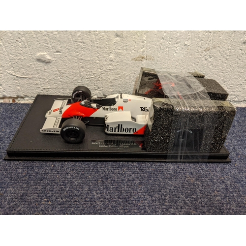 97 - A boxed model F1 McLaren MP412- 1984 NR.8 - N Lauda WC limited edition 500 pieces by GP Replicas
Loc... 