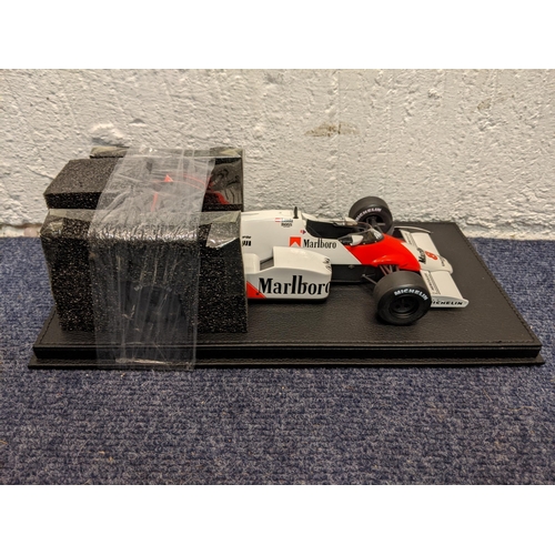 97 - A boxed model F1 McLaren MP412- 1984 NR.8 - N Lauda WC limited edition 500 pieces by GP Replicas
Loc... 