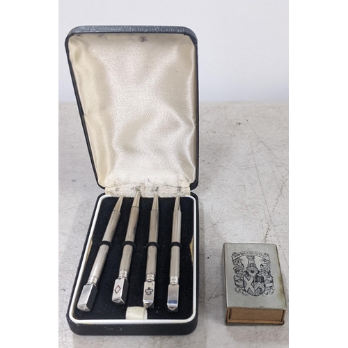 109 - A cased set of sterling silver bridge pencils and a silver coloured matchbox holder
Location CAB
If ... 