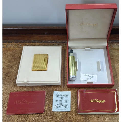 115 - A boxed gold plated DuPont lighter with embossed decoration engraved CH, 4cm x 5cm
Location: CAB
If ... 