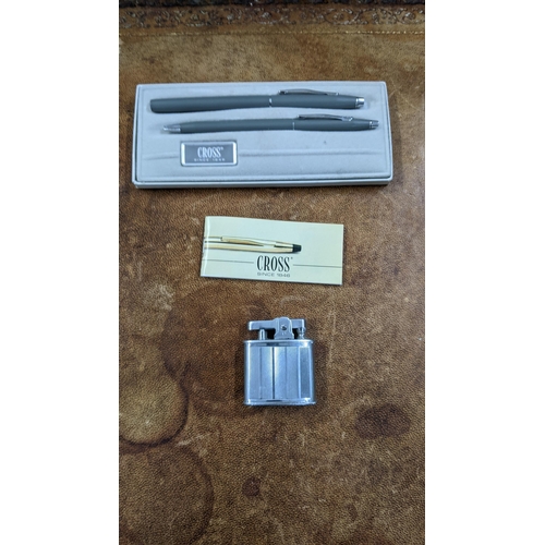 116 - A boxed Cross pen set with leaf along with a Ronson standard lighter
Location: CAB
If there is no co... 