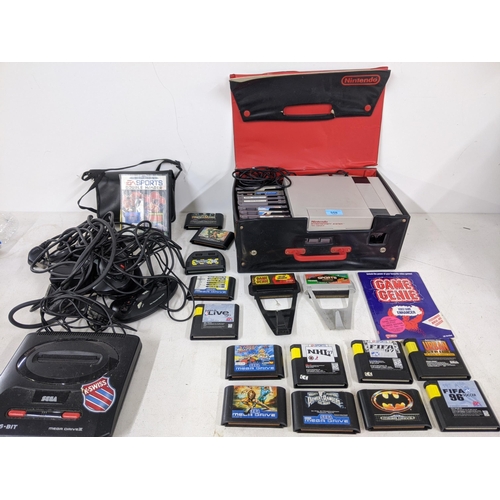 558 - Nintendo Entertainment system and a Sega 16-bit Megadrive II and games to include NBA Live 96, Super... 