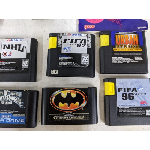 558 - Nintendo Entertainment system and a Sega 16-bit Megadrive II and games to include NBA Live 96, Super... 