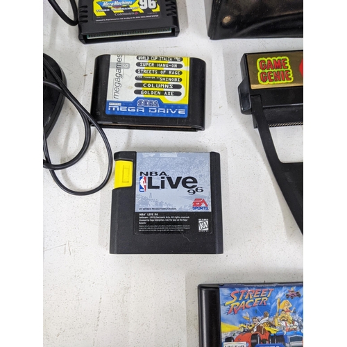 558 - Nintendo Entertainment system and a Sega 16-bit Megadrive II and games to include NBA Live 96, Super... 