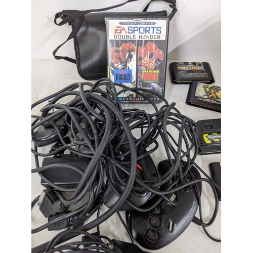 558 - Nintendo Entertainment system and a Sega 16-bit Megadrive II and games to include NBA Live 96, Super... 