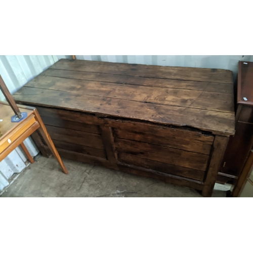 592 - An 18th century French oak chest with a planked top and sides 68cm h x 155cm w Location: RCON
If the... 