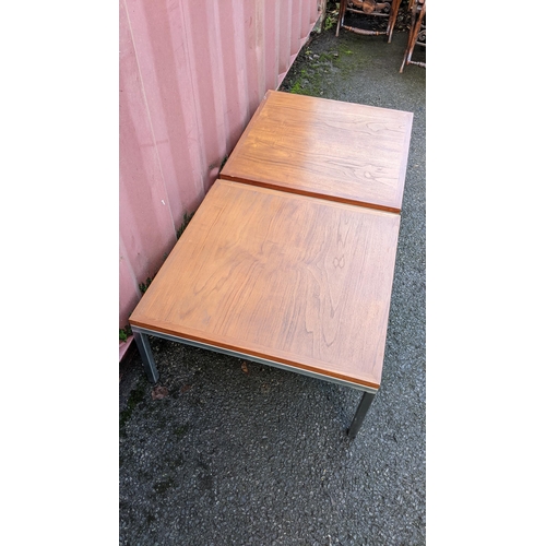 102 - A pair of vintage walnut topped walnut and chrome coffee tables, possibly by Knoll, each of square f... 