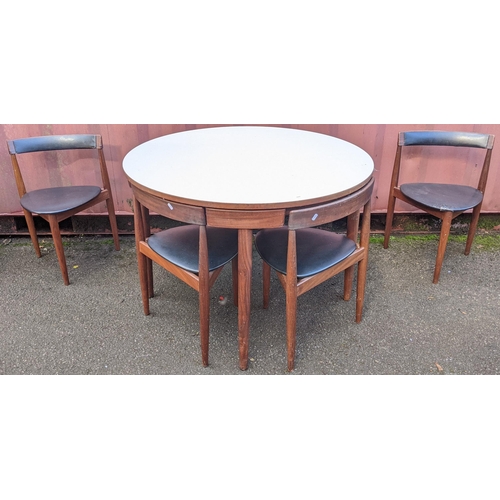 105 - A 1960s Frem Rojle 'Roundette' teak table and four chairs by Hans Olsen, the circular dining table h... 