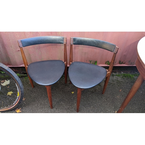 105 - A 1960s Frem Rojle 'Roundette' teak table and four chairs by Hans Olsen, the circular dining table h... 