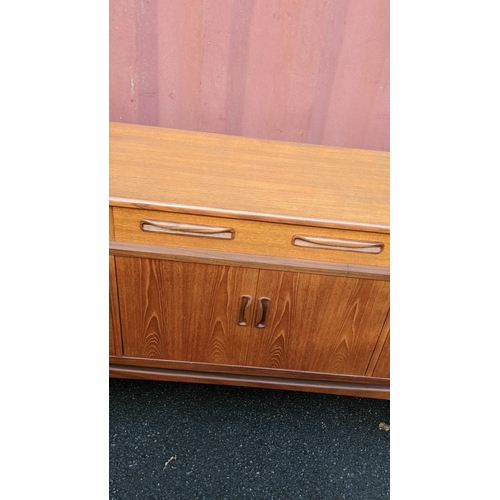 106 - A mid 20th century G-Plan Fresco range teak sideboard, designed by Victor B Wilkins, having four dra... 