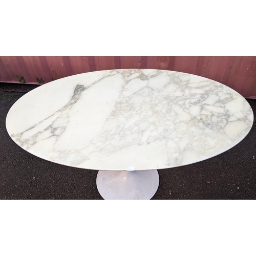 108 - Eero Saarinen (1910-1961) A Tulip dining table, having a white lacquered base with oval marble top, ... 