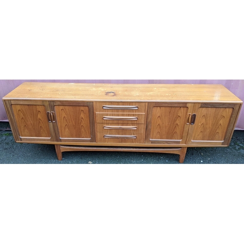 109 - A mid 20th century G-Plan Fresco range teak sideboard, designed by Victor B Wilkins, having four cen... 