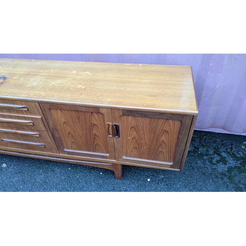 109 - A mid 20th century G-Plan Fresco range teak sideboard, designed by Victor B Wilkins, having four cen... 