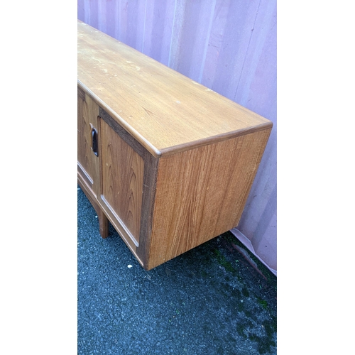 109 - A mid 20th century G-Plan Fresco range teak sideboard, designed by Victor B Wilkins, having four cen... 