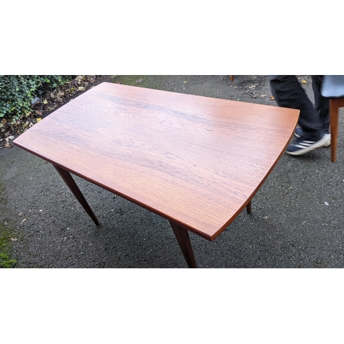 110 - A mid 20th century retro teak extending dining table together with six teak dining chairs, the table... 