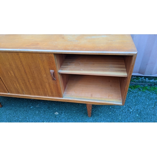 112 - Clausen & Son - A retro 20th century Danish designer teak sideboard credenza having a central bank f... 