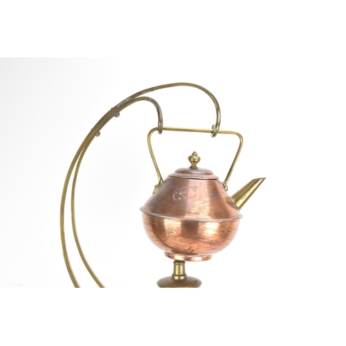 133 - A late 19th century Aesthetic Movement Benham & Froud copper spirit kettle, designed by Dr Christoph... 