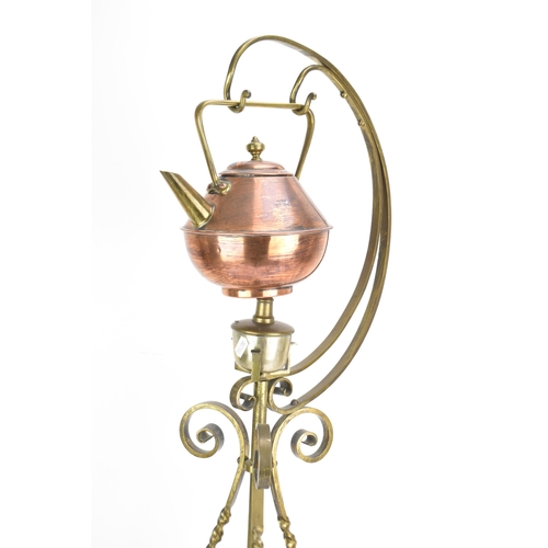 133 - A late 19th century Aesthetic Movement Benham & Froud copper spirit kettle, designed by Dr Christoph... 