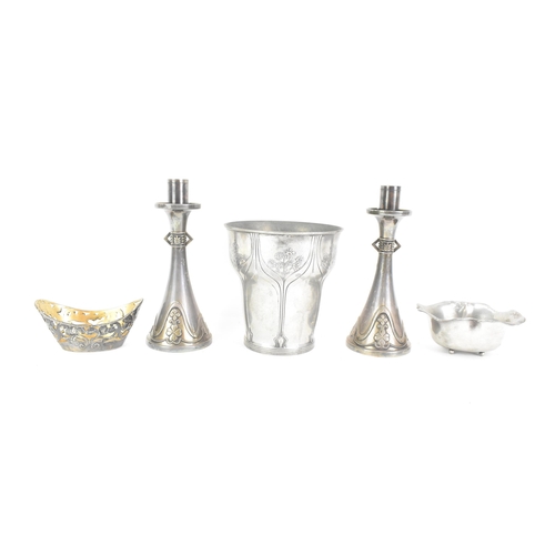 137 - A selection of late 19th/early 20th century pewter to include a pair of Art Nouveau candlesticks, 17... 