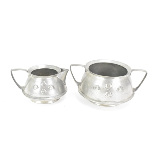 138 - A selection of Liberty Tudric pewter to include a matching sugar and milk jug, both numbered 03030, ... 