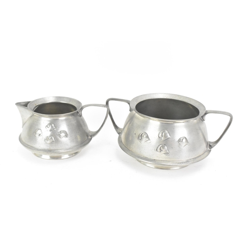 138 - A selection of Liberty Tudric pewter to include a matching sugar and milk jug, both numbered 03030, ... 