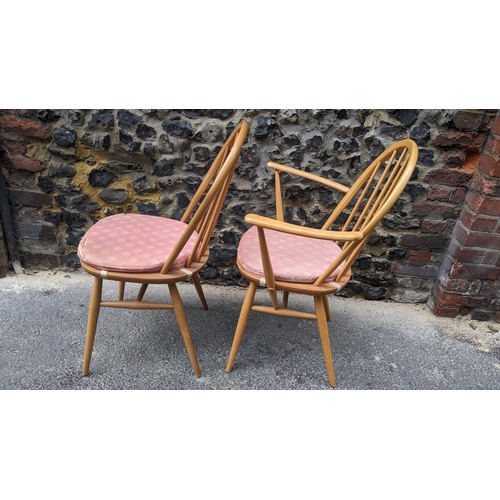 139 - Lucian Ercolani for Ercol, two vintage Windsor range elm and beech chairs with hoop spindle backs to... 