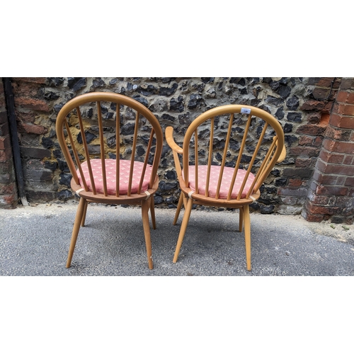 139 - Lucian Ercolani for Ercol, two vintage Windsor range elm and beech chairs with hoop spindle backs to... 