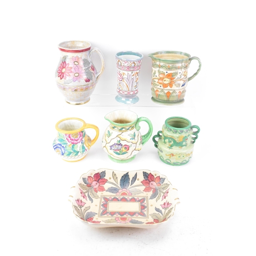 143 - A collection of Art Deco design Charlotte Rhead pottery items to include four Crown Ducal jugs, a Cr... 