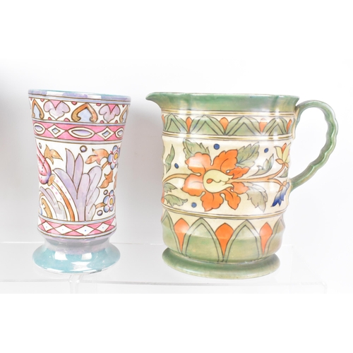 143 - A collection of Art Deco design Charlotte Rhead pottery items to include four Crown Ducal jugs, a Cr... 