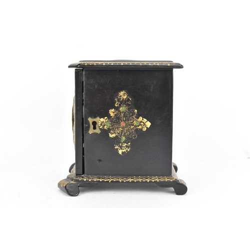 157 - A Victorian ebonised papier-mache jewellery cabinet, decorated in gilt throughout the exterior, the ... 