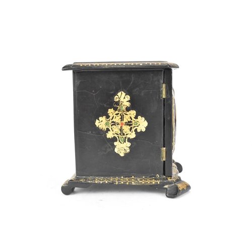 157 - A Victorian ebonised papier-mache jewellery cabinet, decorated in gilt throughout the exterior, the ... 