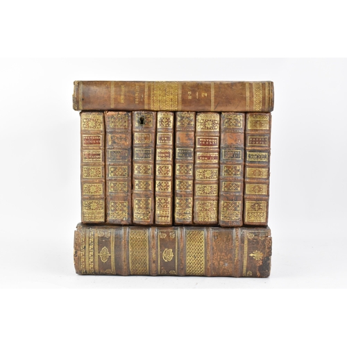 159 - An An early 20th century French leather bound Tantalus in the form of a stack of books, the exterior... 