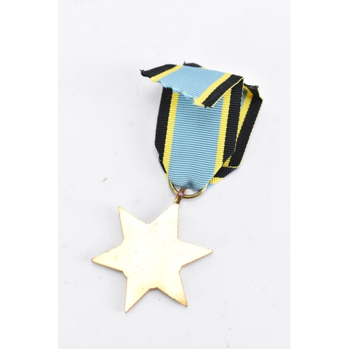 165 - A post Second World War replica of an Air Crew Europe Star medal, un-inscribed, with ribbon
If there... 