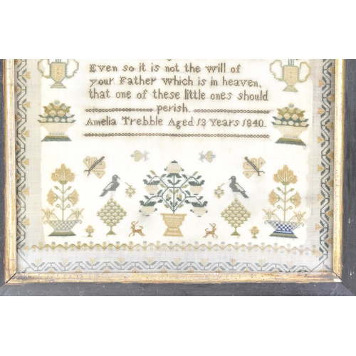 169 - An early Victorian needlework sampler, by Amelia Trebble, aged 13 years, dated 1840, worked with a t... 