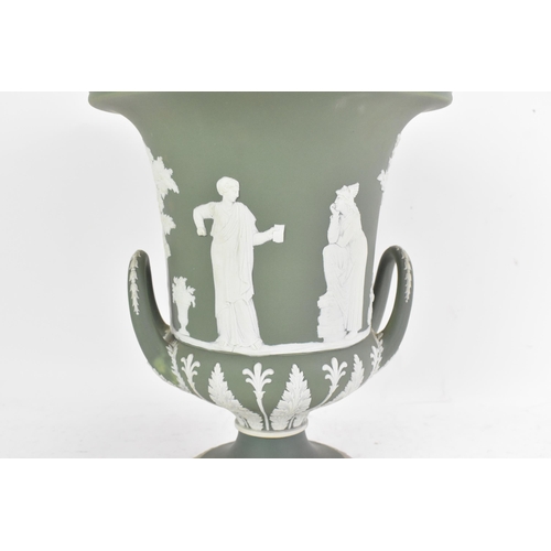 177 - A circa 1900 Wedgwood jasperware vase and cover, of Campana form, in sage green, with twin loop hand... 