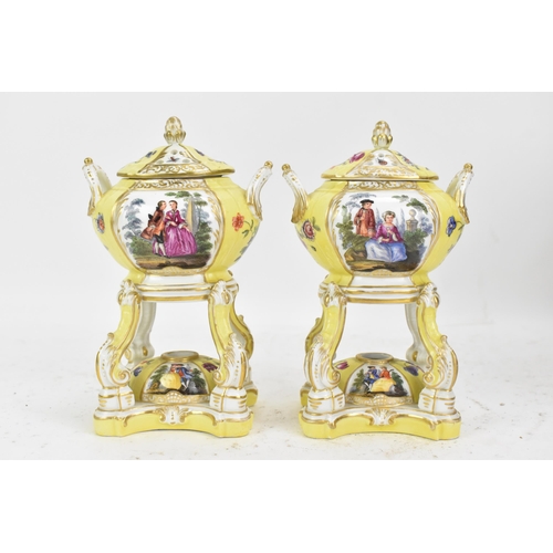 182 - A pair of KPM Berlin porcelain pot pourri's or pastille burners, the twin handled bowls on scroll su... 