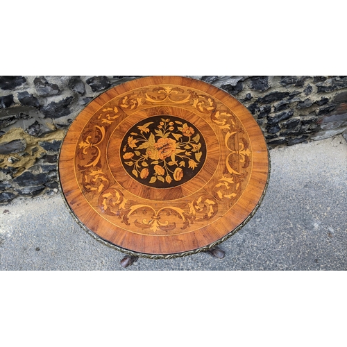 183 - A 19th century wine table, having a walnut veneered top, marquetry inlaid with a flowers to the cent... 