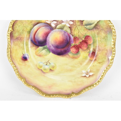 117 - A Royal Worcester fruit decorated cabinet plate, of shaped circular form, hand painted with still li... 