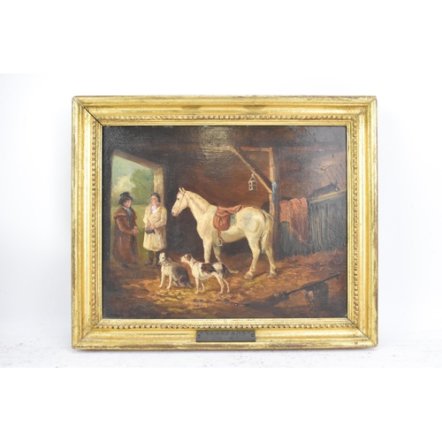 244 - Thomas Hand (1771-1804) An oil on board depicting a stable scene with two figures, horse and two dog... 