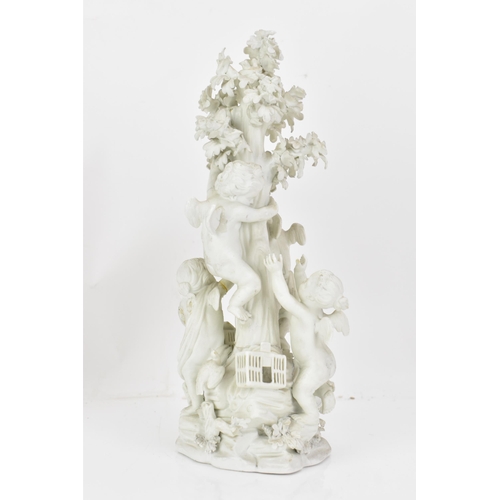 245 - A Derby biscuit porcelain group, circa 1775-85 modelled as four putti circling an oak tree, with bir... 